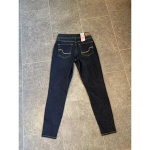 Signature Levi Strauss and Company gold put on skinny jeans size 2